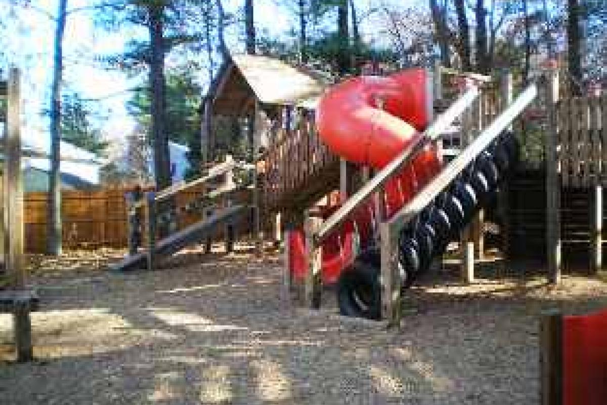 Tire ramp and twisty slide
